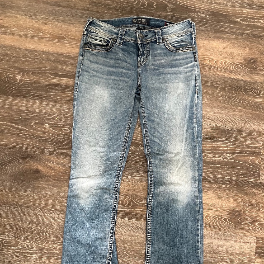 Suki mid rise boot cut silver jeans